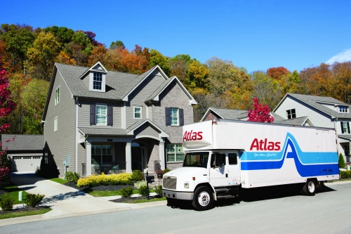 Small Atlas truck in front of house